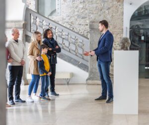 Guide gives family tour of museum